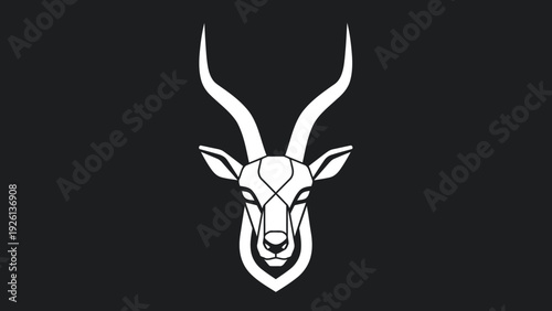 Elegant White Gazelle Head Emblem on Black Background.