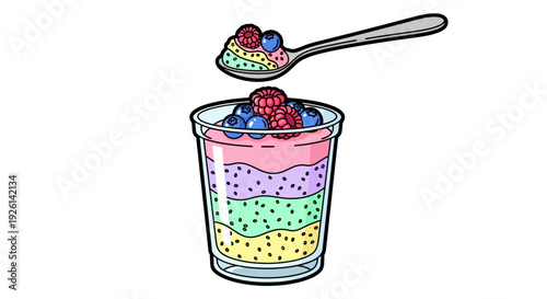 Colorful layered dessert in glass cup.