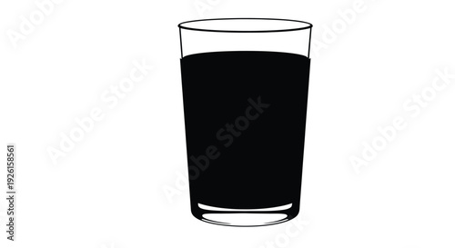 A tall glass of dark liquid presented in black silhouette