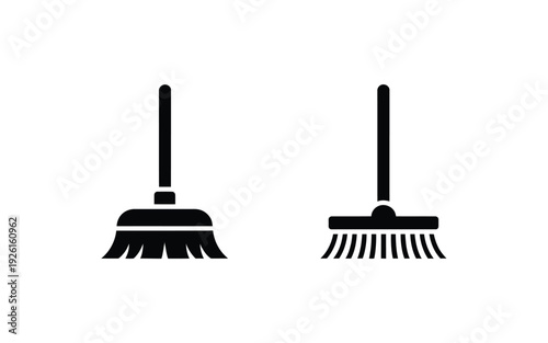 Simple black and white illustration of two brooms on a white background.