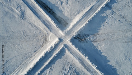 Aerial View of Salt Ponds Forming an X Shape.