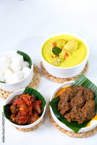 Wallpaper Mural The dishes served during Eid celebrations are rendang, dendeng balado, opor ayam, and ketupat. Isolated on white background Torontodigital.ca