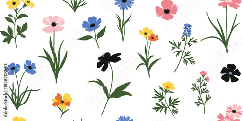 A vibrant array of colorful flowers and lush greenery in full bloom from a top-down view