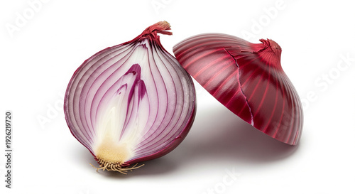 Red onion cut in half revealing crisp layers and clean white core