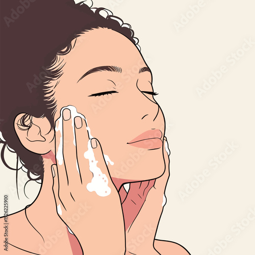 A woman is cleaning her face with foam in a bathroom. She enjoys the moment as part of her morning routine.
