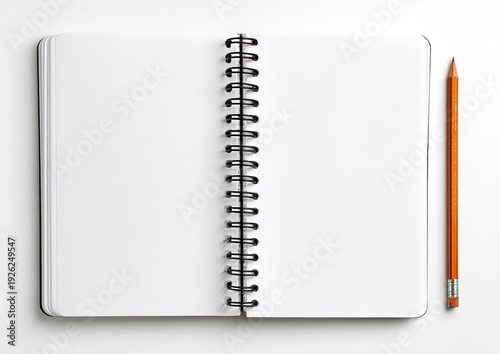 Open spiral-bound notebook with blank white pages and a sharpened pencil on a white surface