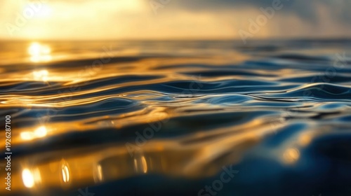 Rippling waterline in golden light at sunset revealing the beauty of nature and the movement of water