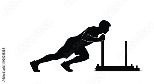 Athlete pushing a weighted sled. Strong man silhouette in cross-training. Fitness and strength workout concept.