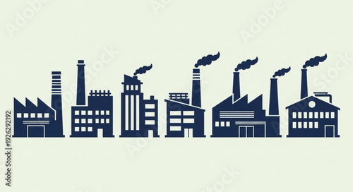 Industrial factory buildings with smoke stacks emitting pollution into the atmosphere.
