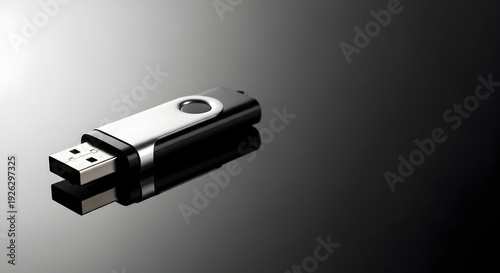 Black and silver usb flash drive on dark surface