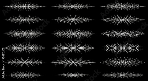 Collection of abstract white explosive burst elements on black background varying in shape and size with dynamic splashes and splatters