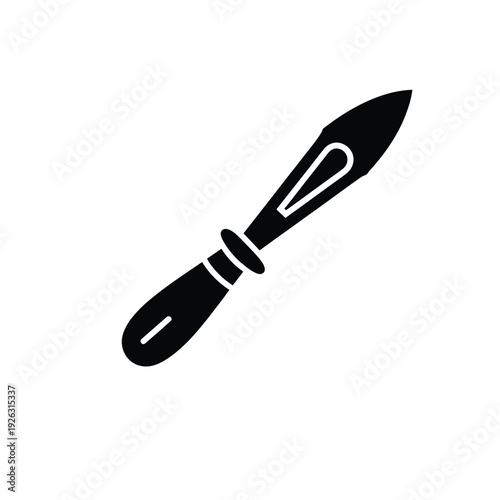 A simple black silhouette of a throwing knife or dart