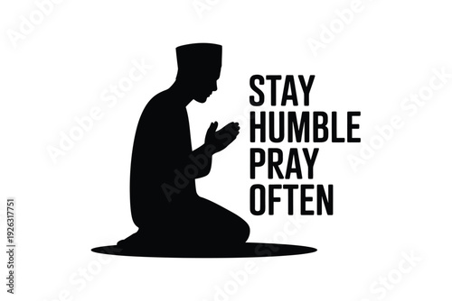 Silhouette of a kneeling man with motivational text stay humble pray often