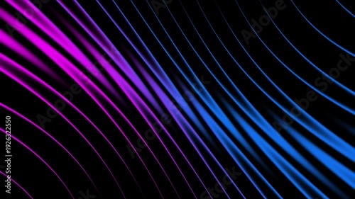 Colorful light waves move smoothly across a dark background creating a visual display of lines and shapes