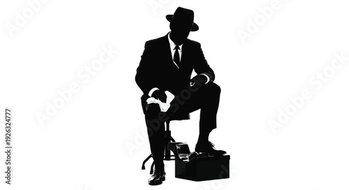 Mysterious man in suit and hat sitting on chair with briefcase