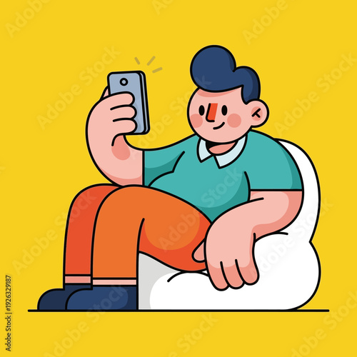 Man taking a selfie while sitting on a bean bag chair, bright yellow background