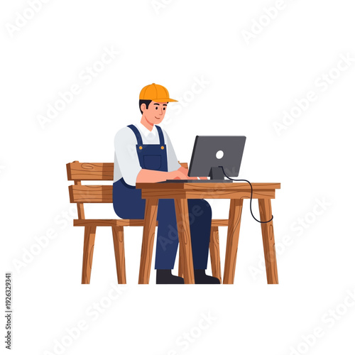 Construction worker in overalls and cap using laptop at wooden desk