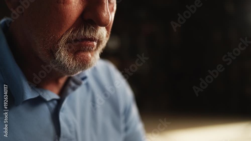 Unhappy senior man taking supplement with water, feeling unwell, health care