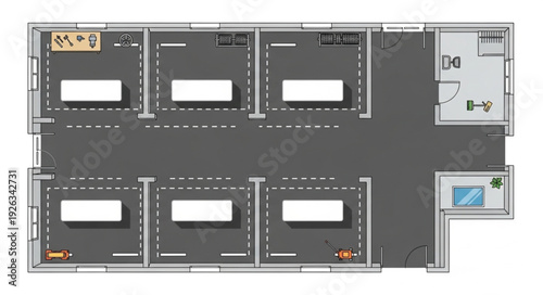 Detailed overhead view of a modern parking garage with multiple parking spaces and a service area.