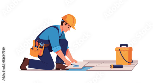 A skilled male construction worker in a yellow hard hat is shown kneeling and meticulously applying blue grout between grey floor tiles on a white background.