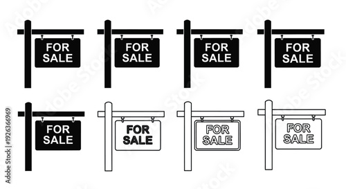 Multiple for sale signs in various perspectives and styles displayed