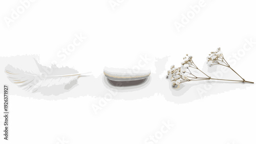 Still life composition of a white feather, small bowl, and baby's breath flowers on a white background with soft shadows.