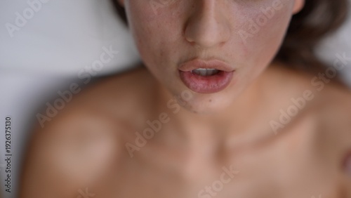 Intimate shot of vocalist performing breathwork session