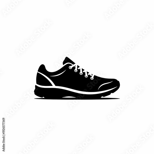 A stylish black running shoe on display, showcasing its sleek design and athletic functionality