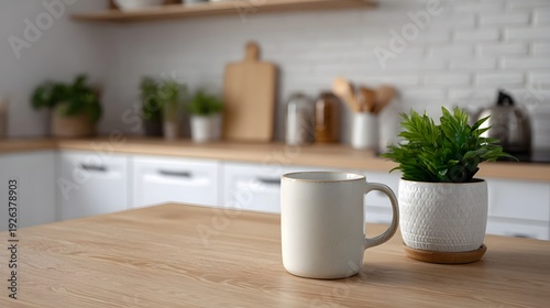 Wallpaper Mural A ceramic mug and a green potted plant sit on a wooden table in a softly blurred kitchen background Torontodigital.ca