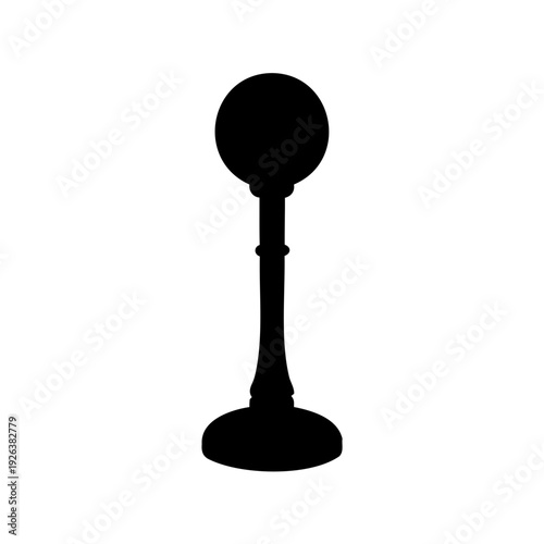 Black silhouette of a vintage microphone on a white isolated background