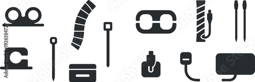 An arrangement of crafting tools including scissors, tape, and various pins laid out on a clean surface. These items highlight the essentials for any creative endeavor and crafting activities.