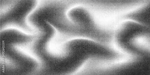 Smooth flowing wave pattern of black and white silk fabric texture with a soft satin motion design for an abstract textile backdrop wallpaper