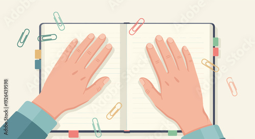 Overhead shot of hands over an open notebook with lined pages, colorful paperclips, and tabs, conveying organization, creativity, or note-taking. Ideal for business and education concepts.