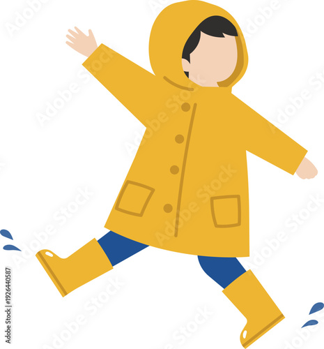 黄色いレインコートを着てスキップで歩く元気な子供
