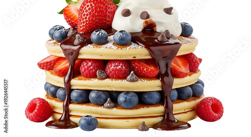 Stack of fluffy pancakes with fresh berries chocolate syrup and whipped cream topping