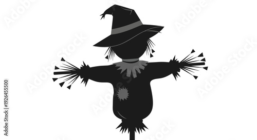 Silhouette of a Scarecrow with Hat and Straw Arms