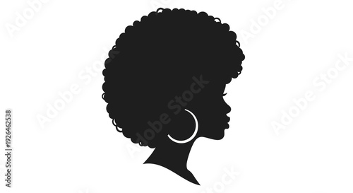 Silhouette of woman with afro hairstyle and hoop earrings