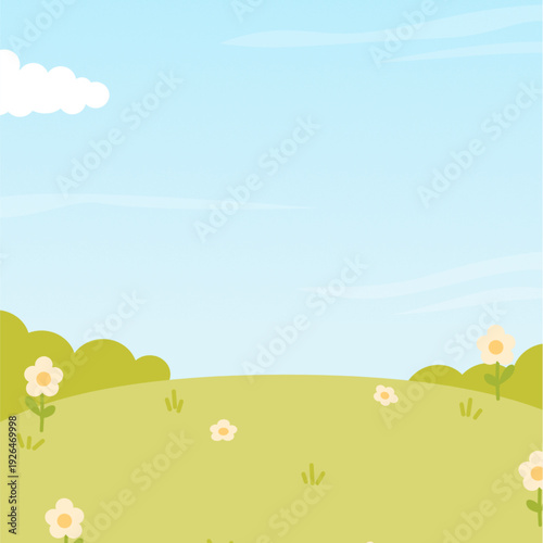 Beautiful green hillside with white flowers under blue sky