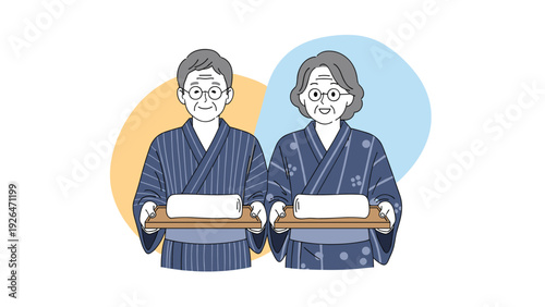 Senior Japanese couple wearing traditional yukata robes while holding wooden trays with rolled wet towels in a spa resort.