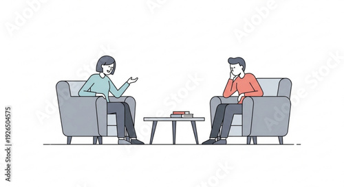 Two people sitting on gray couches having a conversation with a coffee table in between them