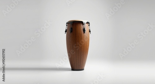 Traditional African conga drum standing vertically isolated on a white background