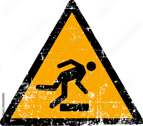 Grunge tripping hazard warning sign worn scratched ISO 7010 W007 symbol