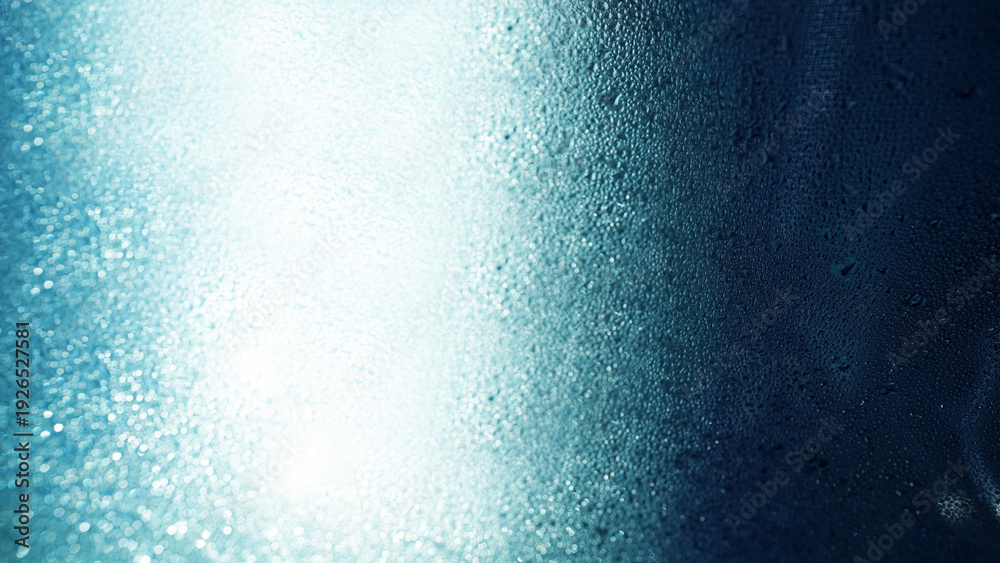Obraz premium Sunlit Glass Surface with Shimmering Water Droplets and Bokeh