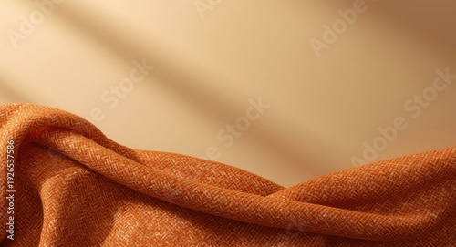 Virgin wool herringbone fabric background in orange shades suited for textile and decor designs
