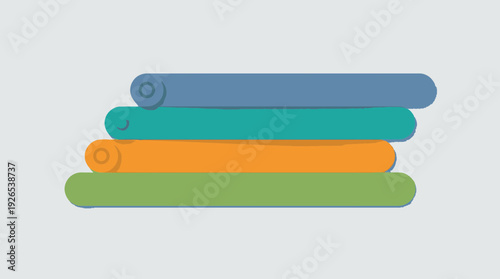 Vibrant stack of colorful rolled up mats or rugs