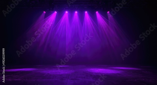 Abstract stage backdrop with radiant purple neon rays and reflective spotlights