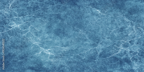 Clear blue water surface with ripples and light reflections forms a transparent liquid texture of a swimming pool or summer ocean wave pattern