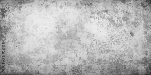 An aged dark gray grunge wall background features a dirty textured concrete surface with a rough vintage stone pattern and a weathered black cement backdrop design