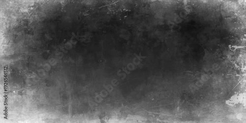 Dark black and white grunge wall background featuring a weathered surface texture with atmospheric smoke and storm clouds for a dramatic dark night design backdrop