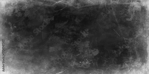Abstract black and white grunge background featuring a dark storm cloudscape with smoky textures and ethereal light motion across a moody grey night sky